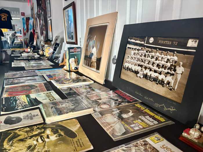 The exhibit featured an entire room filled with photos, jerseys, figurines, baseballs, baseball cards, bats and other collectible Roberto Clemente items.
