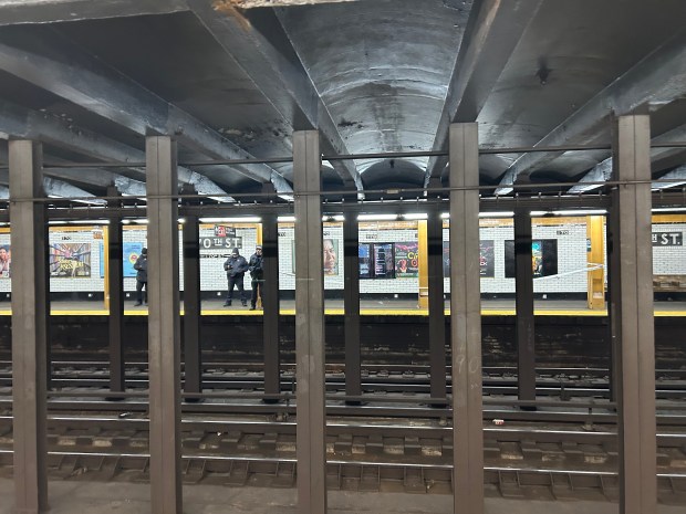 NYPD secure the scene on the platform of the B and D subway station on East 170th Street in the Bronx after a shooting on Jan. 5, 2026. (Kerry Burke/NYDN) 