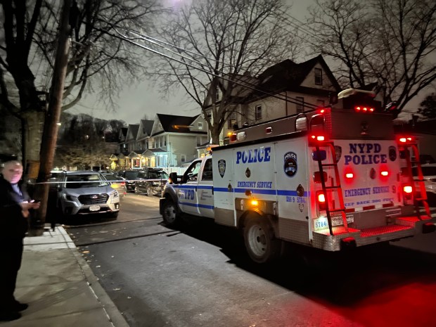 A 17-year-old was stabbed in the neck and killed by a group of teens chasing him outside of 85-57 76th Street in Woodhaven, Queens on Jan. 9, 2026. (Kerry Burke/NYDN) 