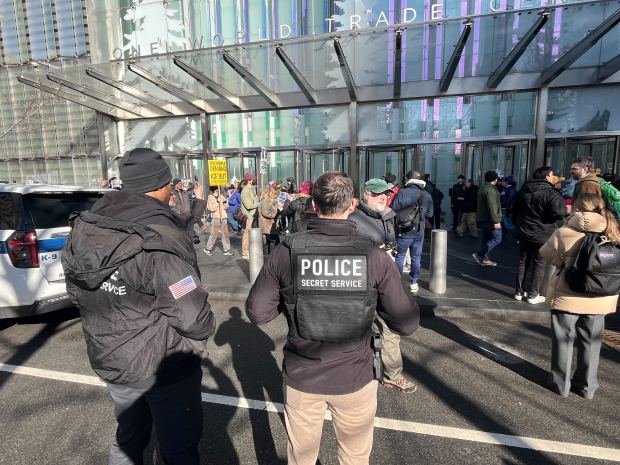 Protest outside of the World Trade Center as Secretary of Homeland Security Kristi Noem speaks inside promoting anti-immigration efforts in New York City on Thursday, Jan. 8, 2025. 
