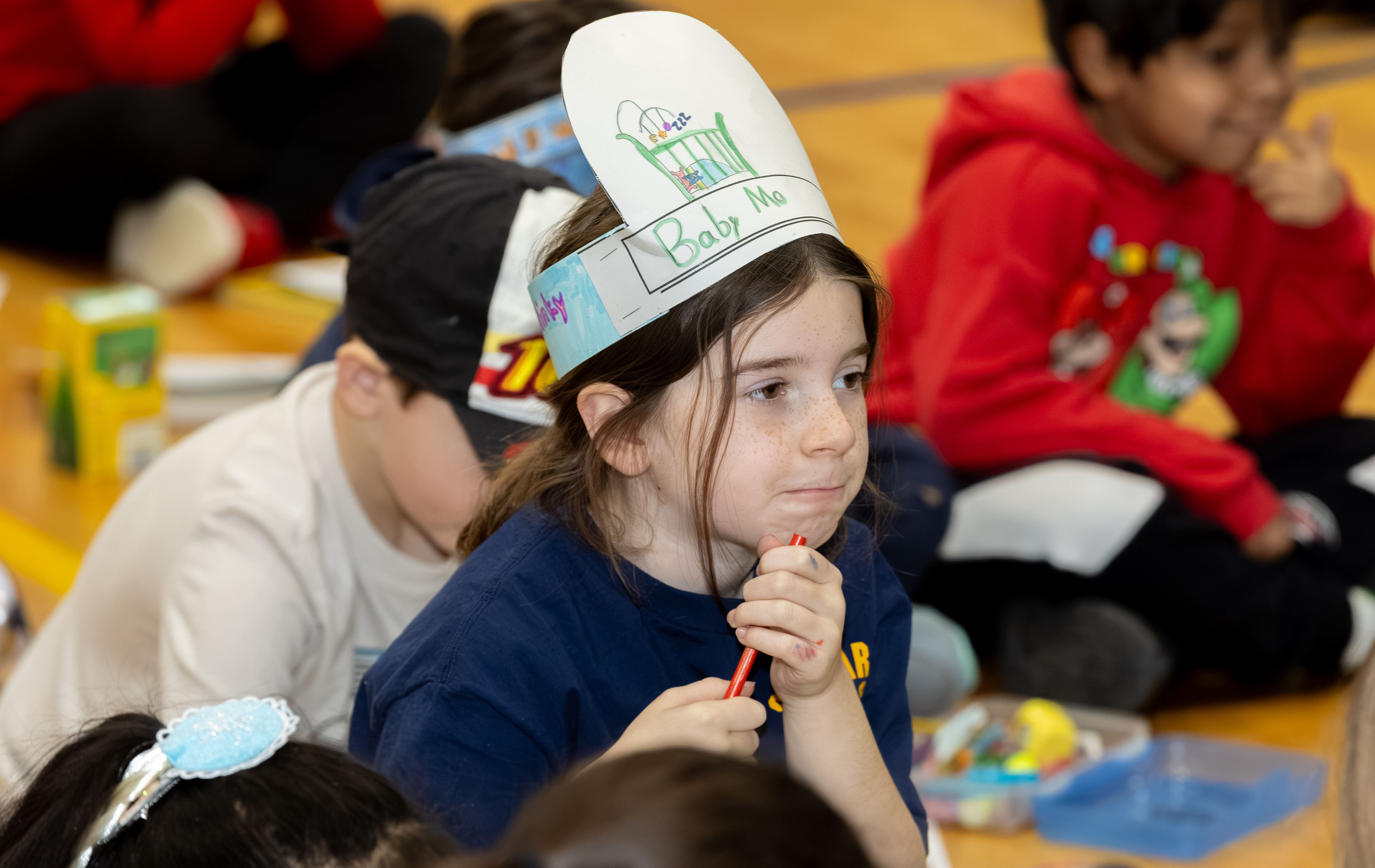 Borough President Vito Fossella and Jann Amato, regional superintendent of the Catholic School Region of Staten Island, celebrate literacy day with first and second graders as part of Catholic Schools Week at the St. Charles School in Oakwood on Wednesday, Jan. 28, 2026 (Advance/SILive.com | Jason Paderon)