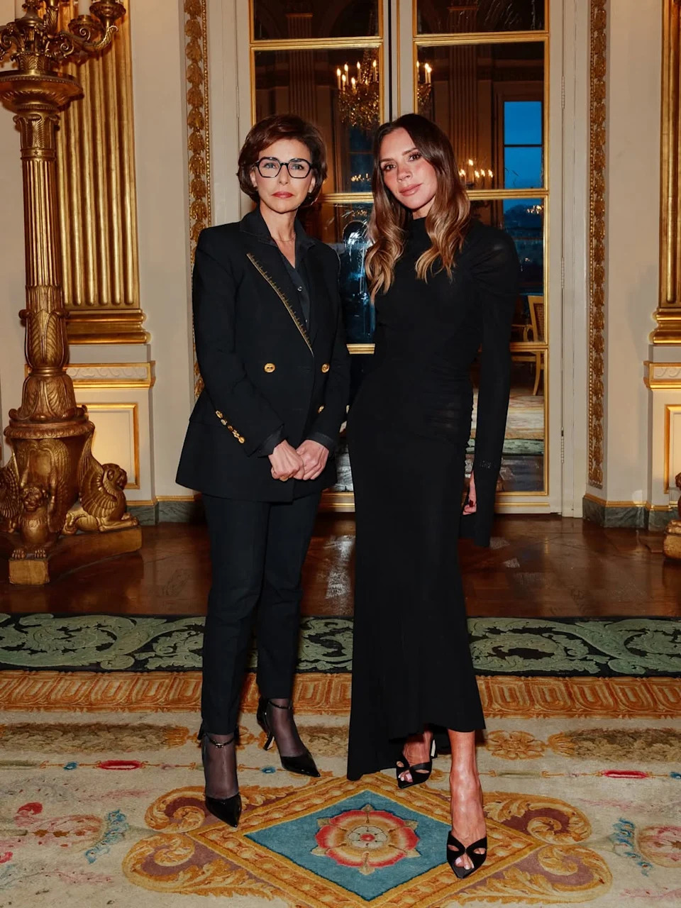 Victoria Beckham poses following her appointment as a Chevalière of the Order of Arts and Letters, an honor recognizing her contributions to fashion and culture.