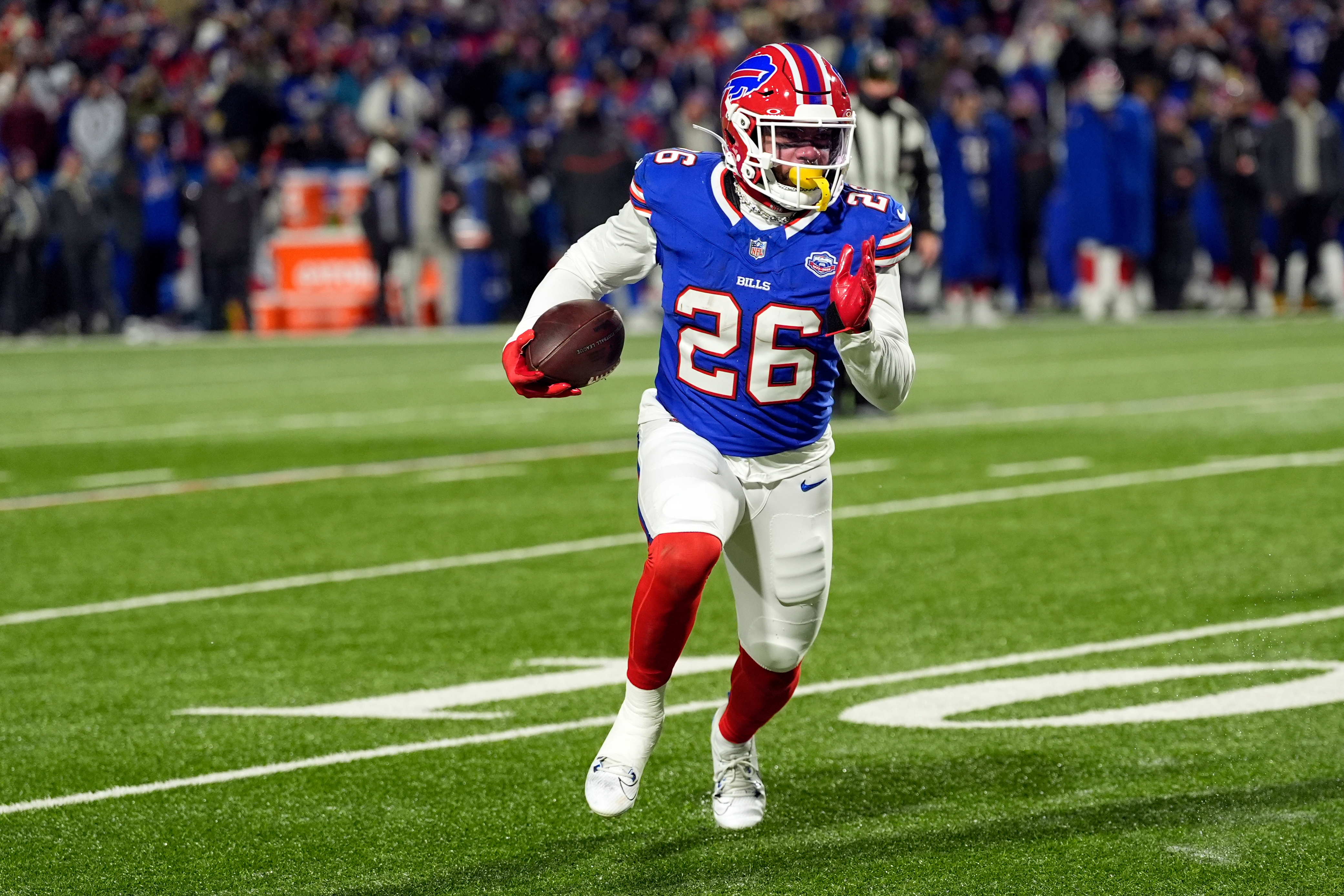 Buffalo Bills running back Ty Johnson carries the ball for a touchdown against the New York Jets in the first half of an NFL football game Sunday, Jan. 4, 2026, in Orchard Park, N.Y. (AP Photo/Seth Wenig)