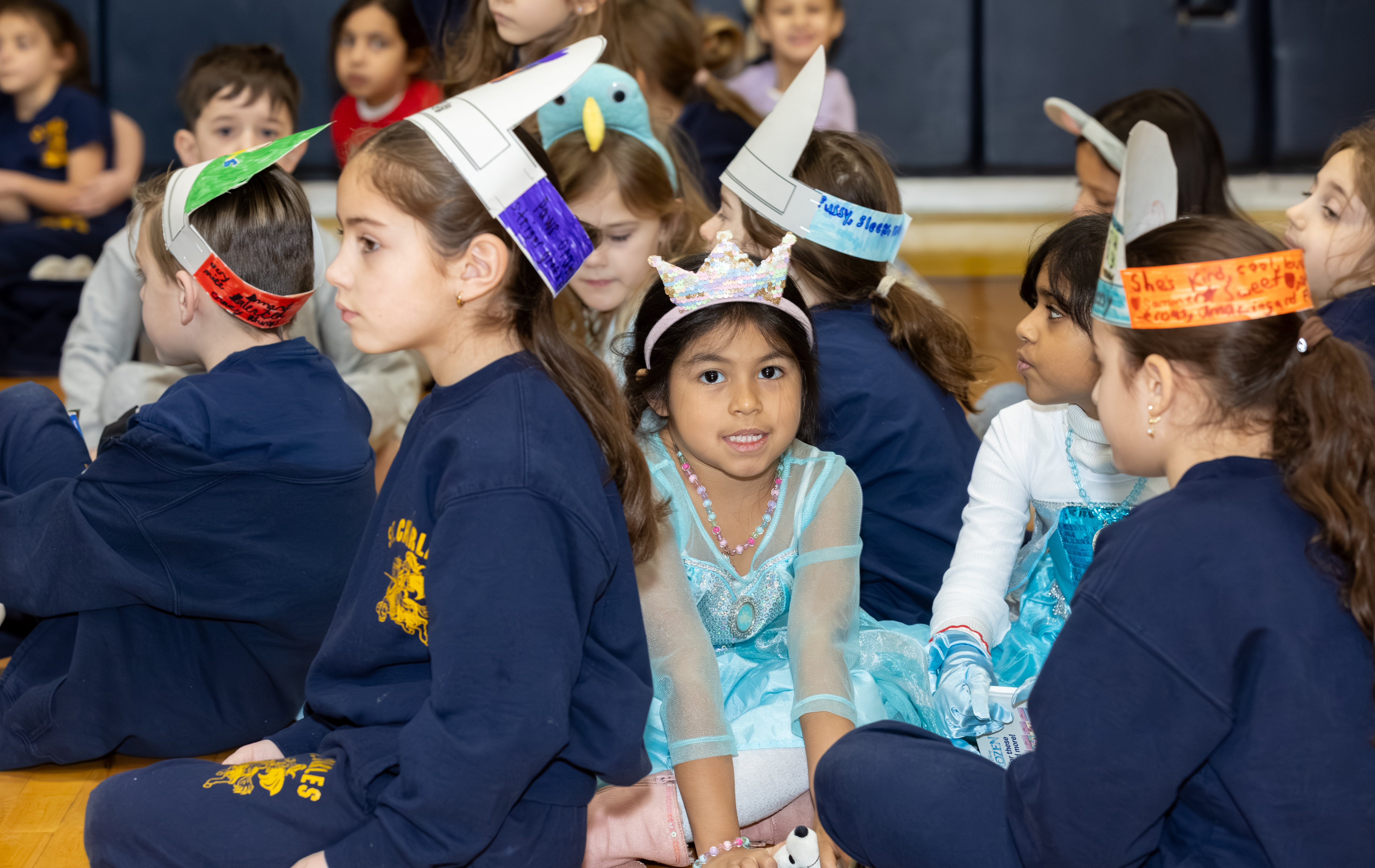 Borough President Vito Fossella and Jann Amato, regional superintendent of the Catholic School Region of Staten Island, celebrate literacy day with first and second graders as part of Catholic Schools Week at the St. Charles School in Oakwood on Wednesday, Jan. 28, 2026 (Advance/SILive.com | Jason Paderon)