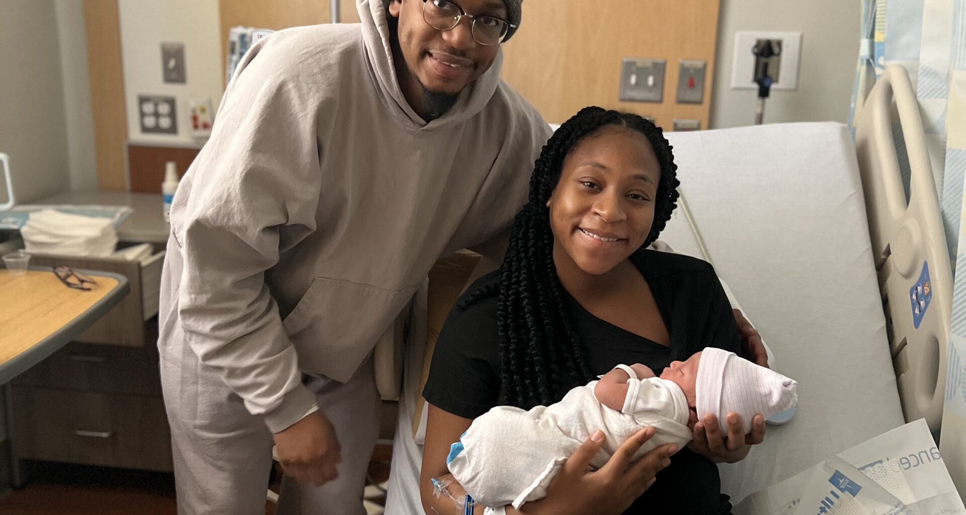 Chelsea Modeste Lewis holds her newborn son Noah Joseph Lewis, who entered the world at 2:21 a.m. on New Year’s morning. Photo courtesy Maimonides Health