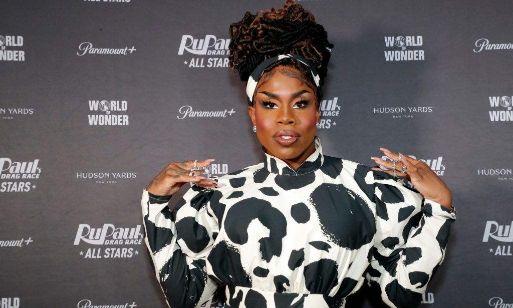 Monet X Change in a cow print dress at the red carpet premiere of Drag Race All Stars 7.