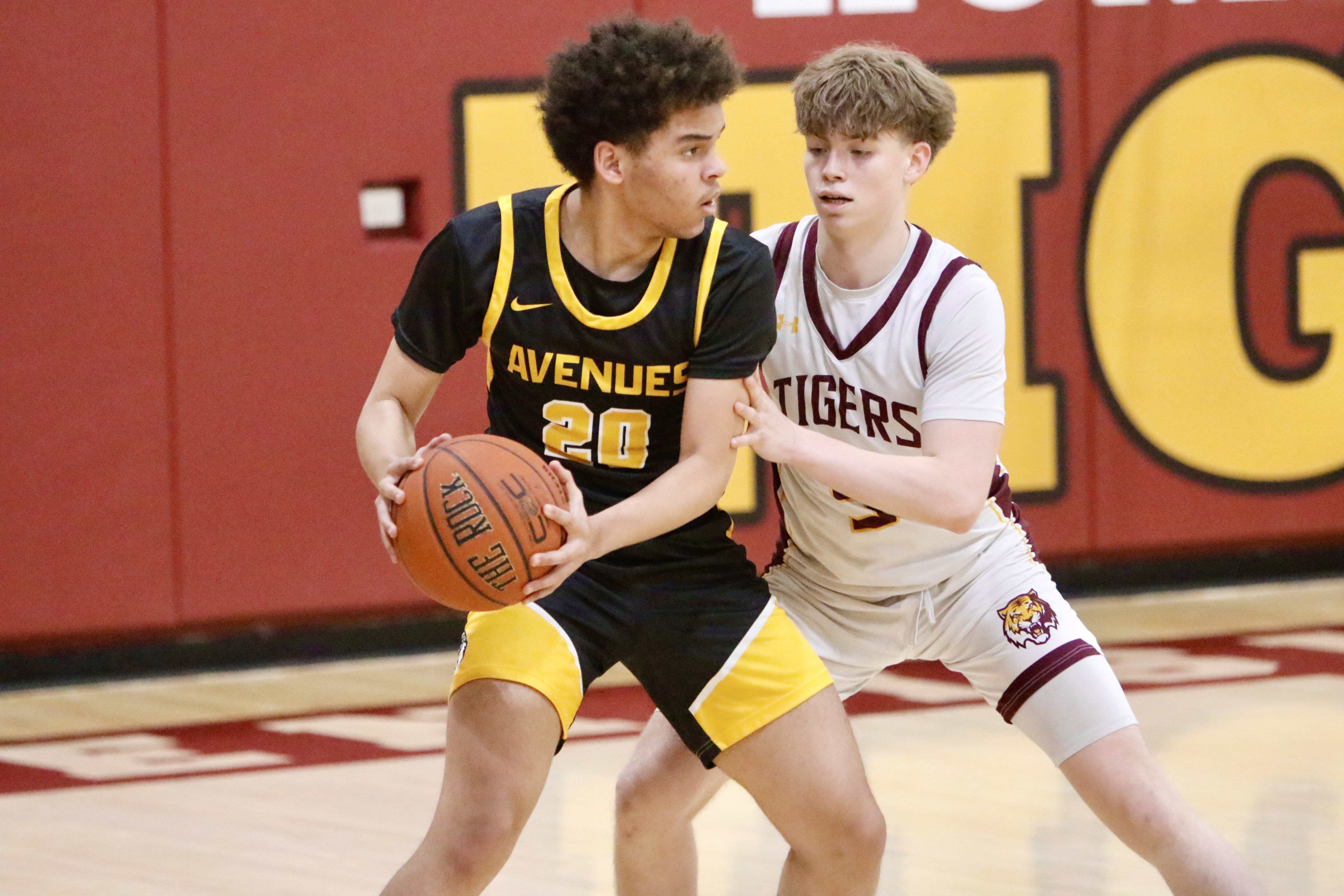 Staten Island Academy's Ayden Howe looks to shut down Avenues' ball-handler during a matchup between the two schools on Jan. 14, 2025.