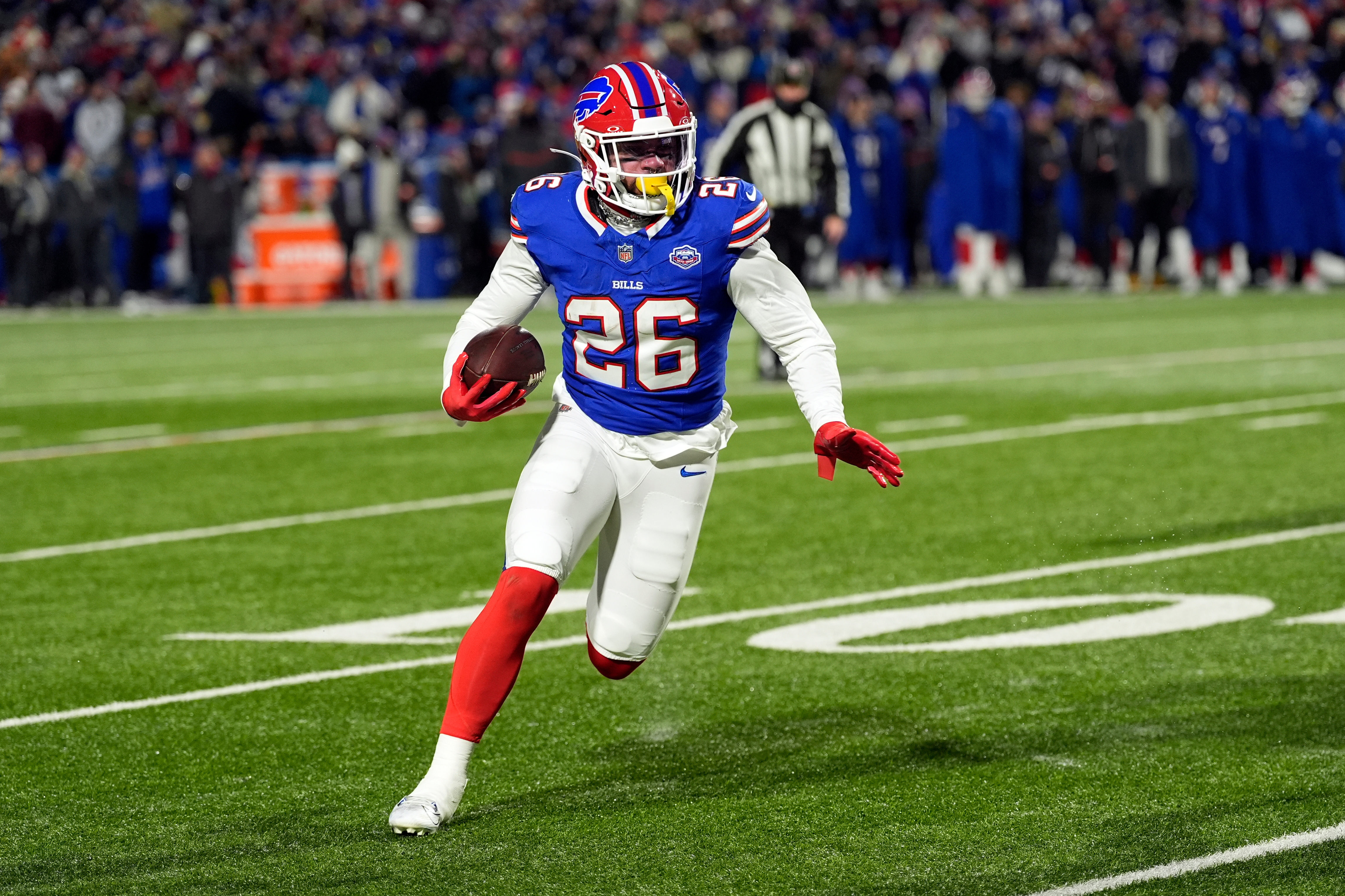Buffalo Bills running back Ty Johnson carries the ball for a touchdown against the New York Jets in the first half of an NFL football game Sunday, Jan. 4, 2026, in Orchard Park, N.Y. (AP Photo/Seth Wenig)