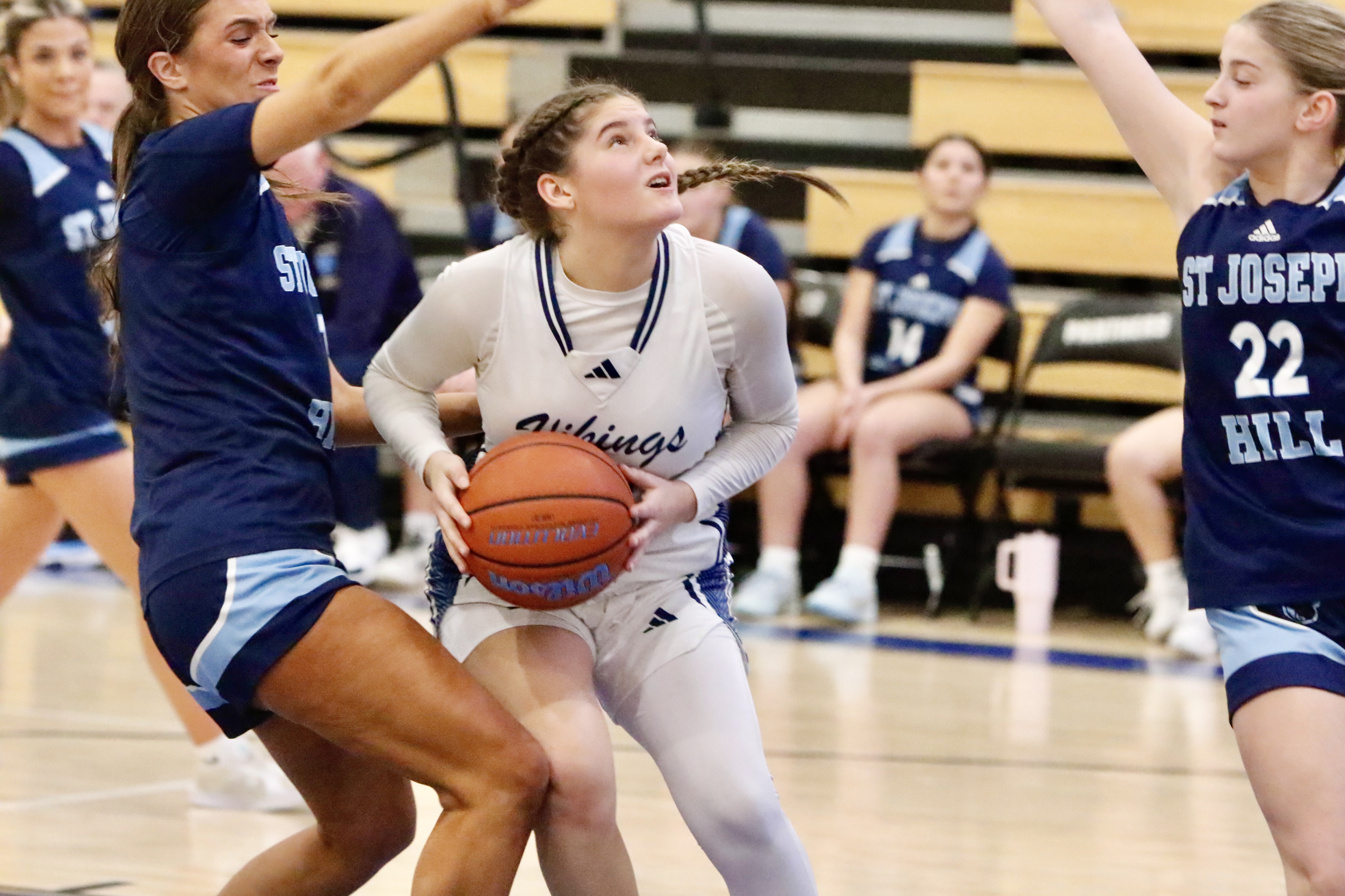 St. Joseph by the Sea's Lila Goldstein looks to evade two defenders during a Borough President's Cup quarterfinal meeting vs. St. Joseph Hill on Jan. 27, 2025.