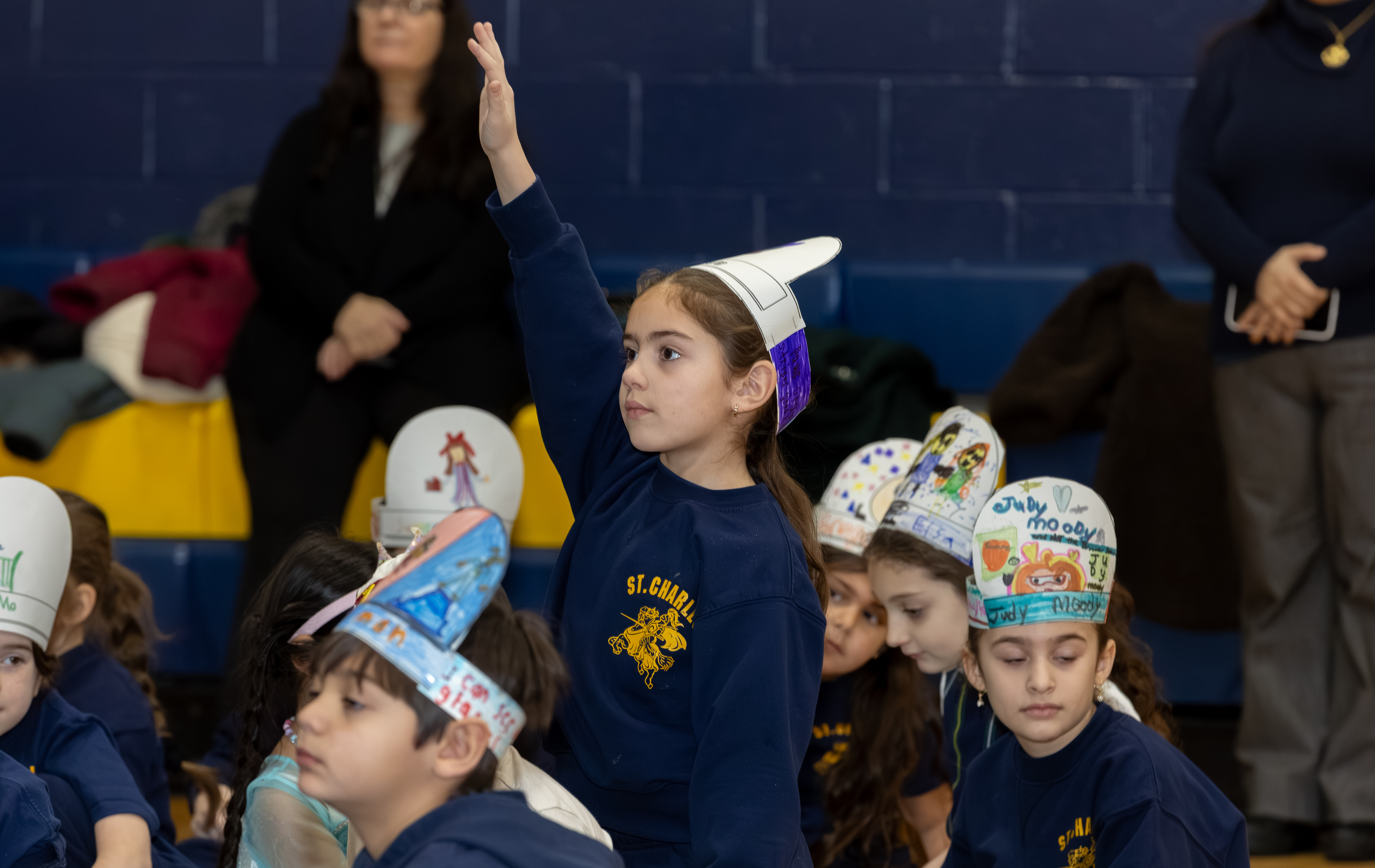 Borough President Vito Fossella and Jann Amato, regional superintendent of the Catholic School Region of Staten Island, celebrate literacy day with first and second graders as part of Catholic Schools Week at the St. Charles School in Oakwood on Wednesday, Jan. 28, 2026 (Advance/SILive.com | Jason Paderon)