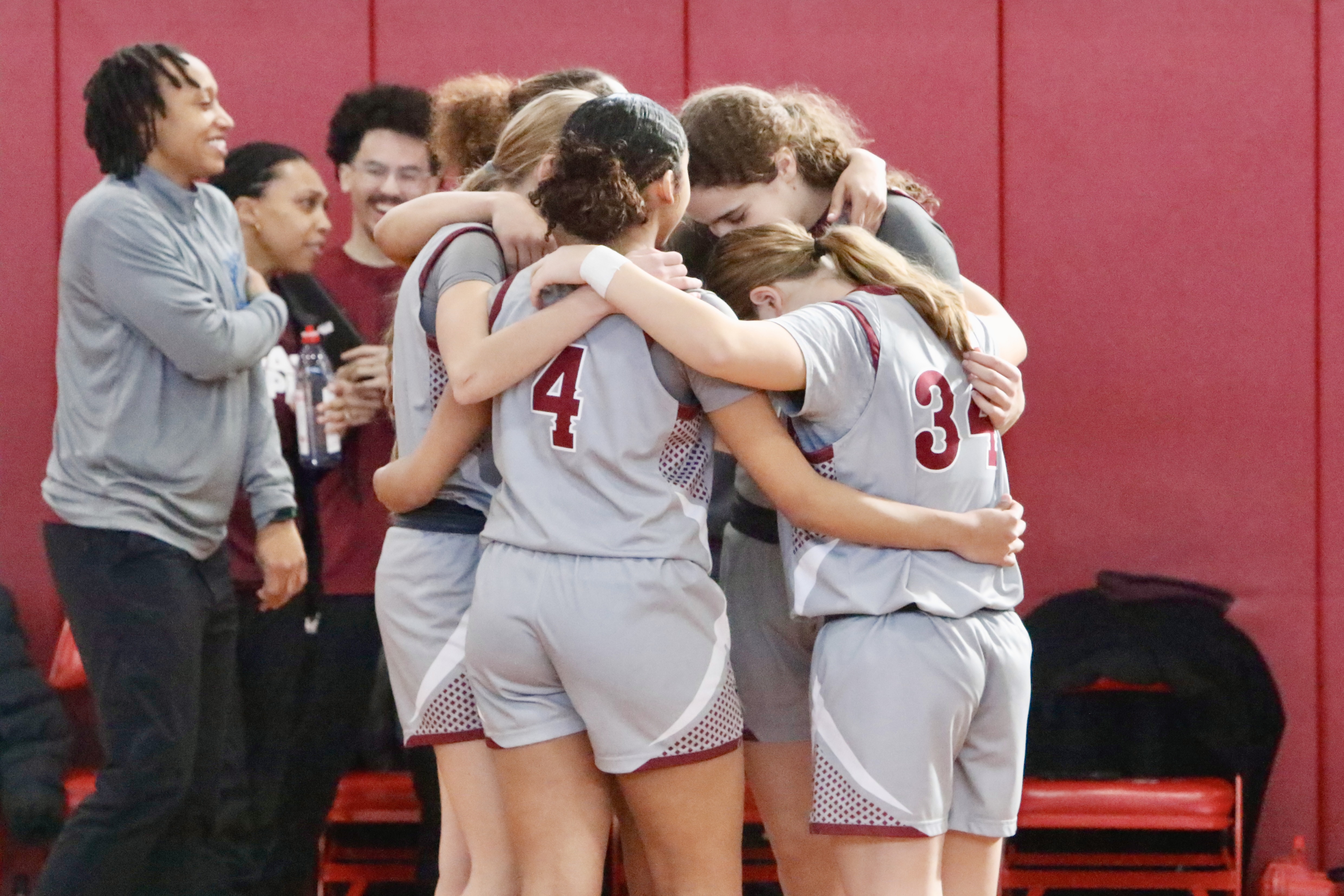 The Curtis girls' varsity basketball team huddles up together before a Borough President's Cup matchup vs. MSIT on Jan. 24, 2026.