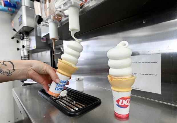 Heather Wild, general manager at Dairy Queen, makes a vanilla cone for a customer Wednesday, Jan. 28, 2026, at the store in Loveland.   (Jenny Sparks/Loveland Reporter-Herald)