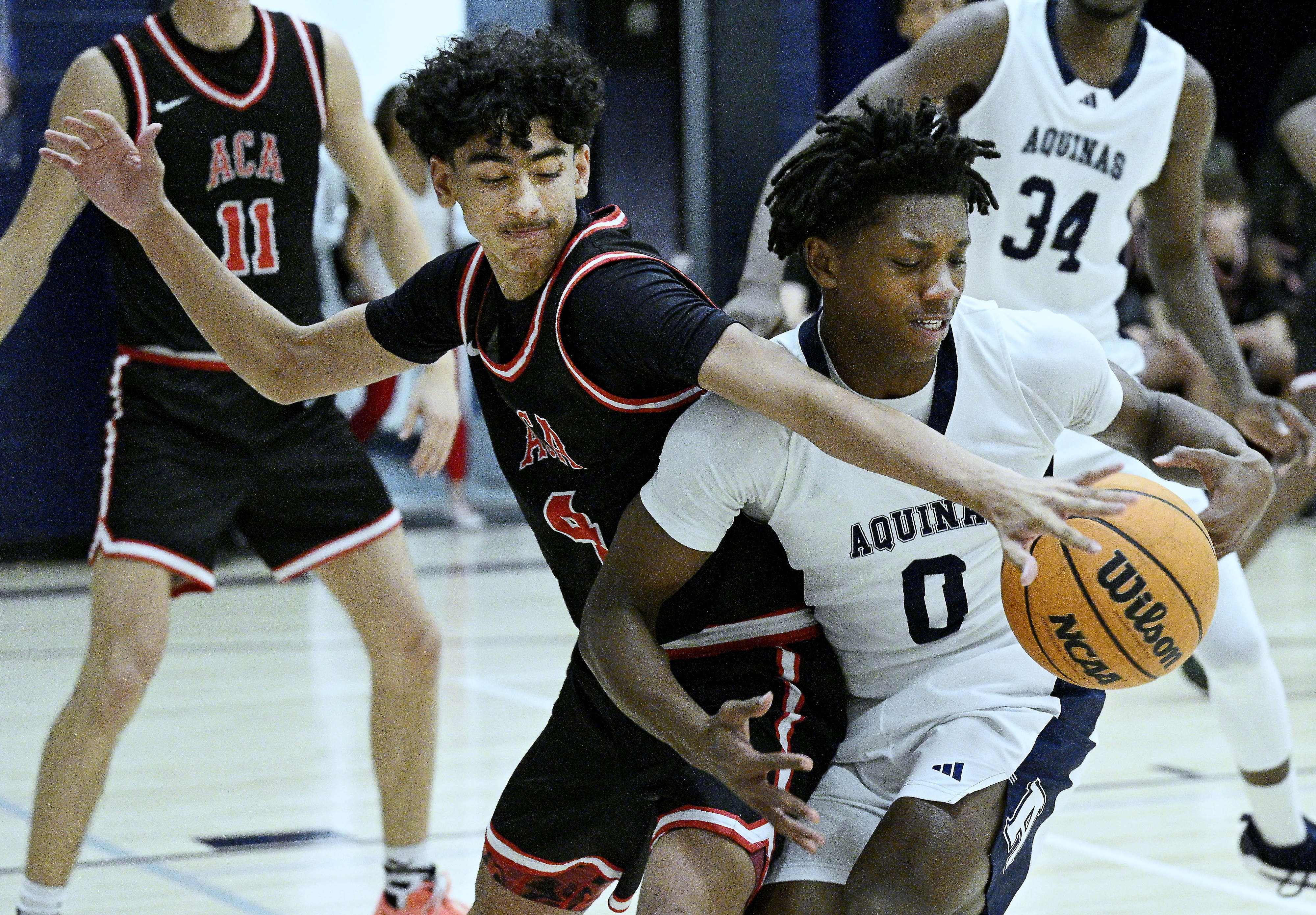 Arrowhead Christian Academy point guard Dylan Spears (4) fights for...