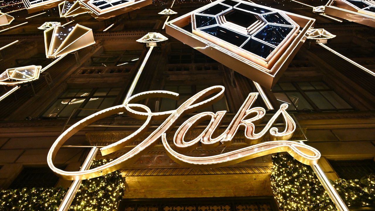 Saks Fifth Avenue holiday light show and window reveal on Monday, Nov. 24, 2025, in New York. (Photo by Evan Agostini/Invision/AP, File)