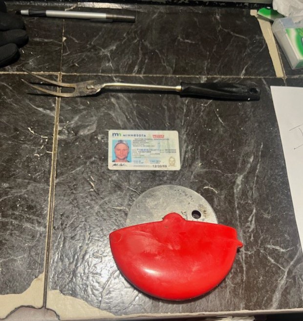 Inside Mark Anderson's backpack, jail staff allegedly found a barbecue fork and what looked to be a pizza cutter, pictured here. (EDNY)