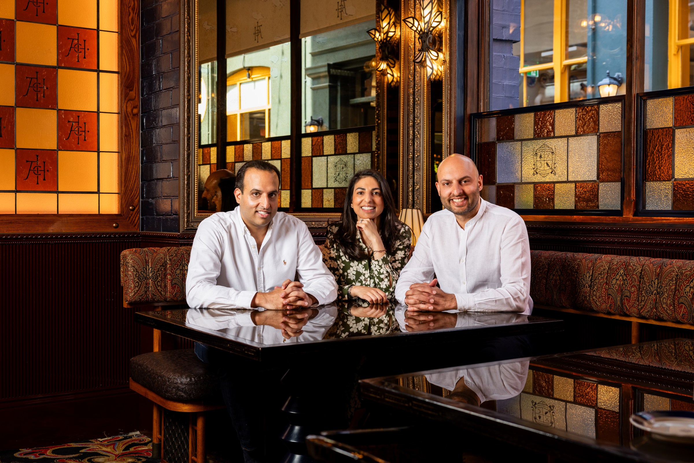 Karam Sethi, Sunaina Sethi, and Jyotin Sethi, founders of JKS Restaurants.