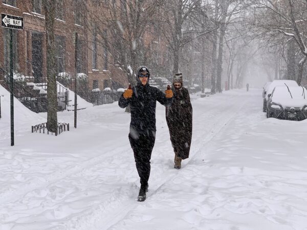 This couple walks along a street in Brooklyn Heights at the height of Sunday’s snowstorm. Photo: Mary Frost, Brooklyn Eagle