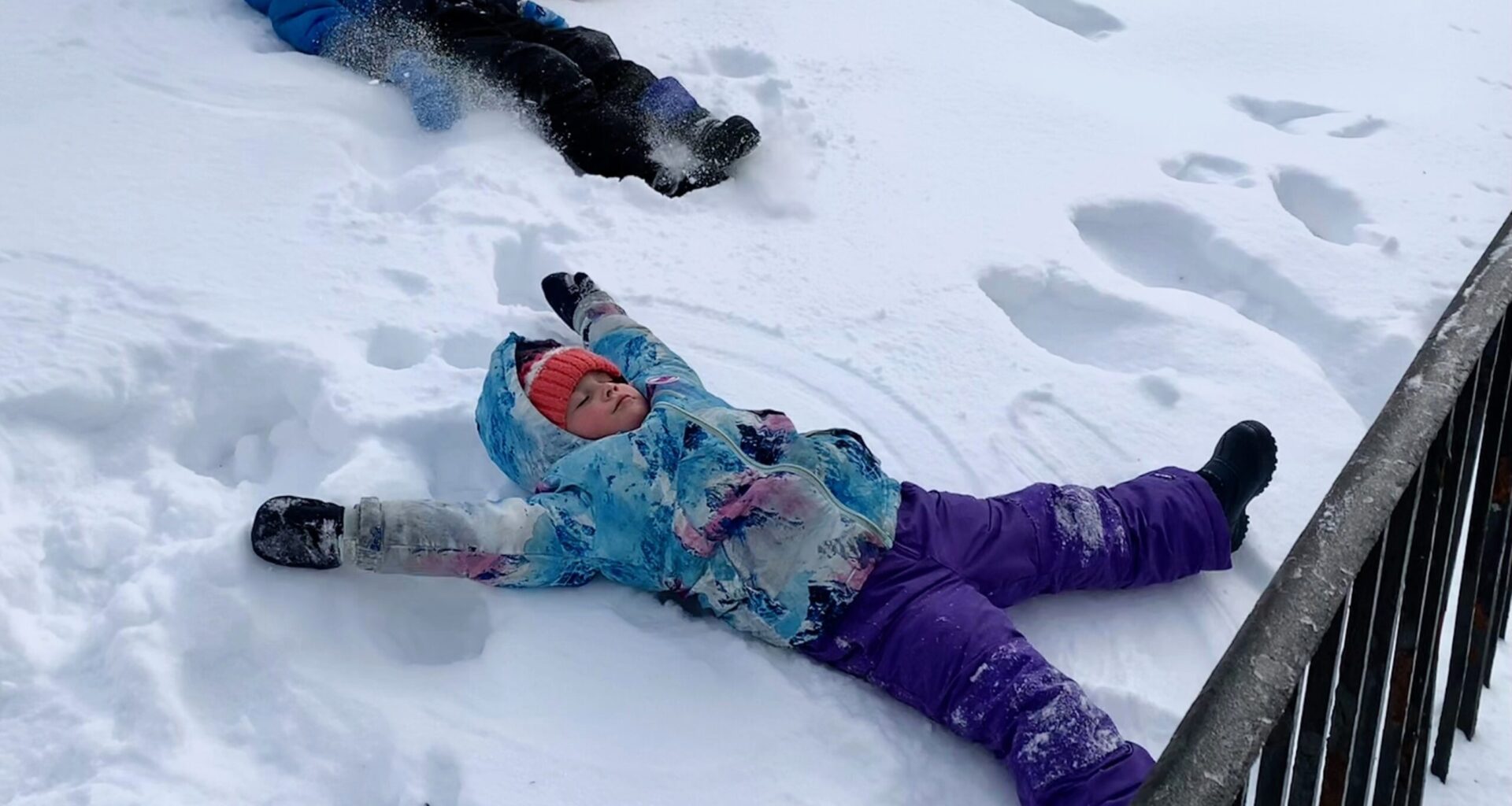 Ruby(front) and her brother Julian made snow angels in Cadman Plaza Park on Monday after the big storm. Photo: Mary Frost, Brooklyn Eagle