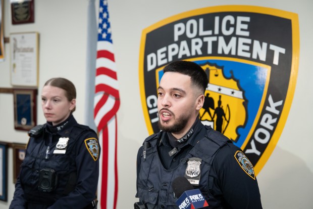 NYPD Officer Freddy Cerpa and Officer Megan Ficken are pictured at the 43rd Precinct stationhouse in the Bronx on Thursday, January 29, 2026. (Barry Williams/ New York Daily News)
