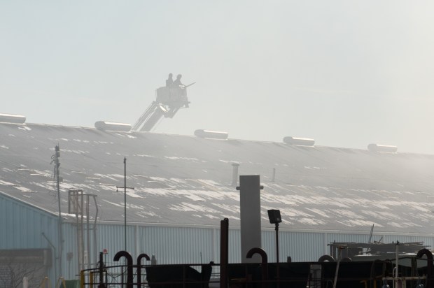 Firefighters battle a large warehouse fire on Columbia St. in Red Hook, Brooklyn, on Wednesday, Jan. 21, 2026. (Gardiner Anderson / New York Daily News)