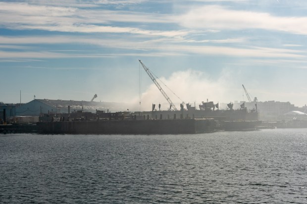 Firefighters battle a large warehouse fire on Columbia St. in Red Hook, Brooklyn, on Wednesday, Jan. 21, 2026. (Gardiner Anderson / New York Daily News)