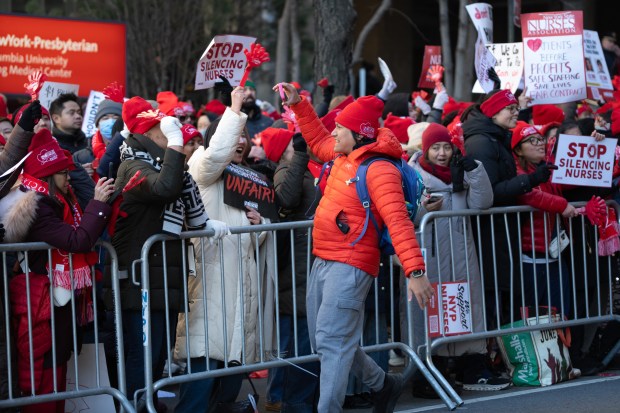 Nurses from New York-Presbyterian Columbia Hospital in Washington Heights walk the picket line on Monday.