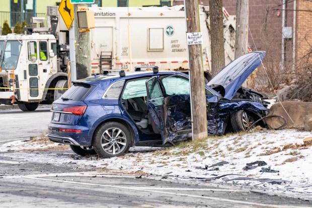 The aftermath of a crash involving a grey Honda HRV SUV and a blue Audi Q5 SUV at the intersection of Forest Hill Rd. and Rockland Ave. in Staten Island on Friday, Jan. 2, 2026. (Theodore Parisienne / New York Daily News)