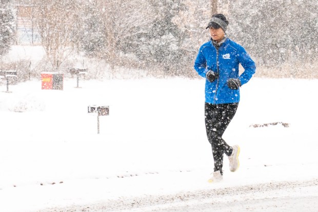 (Women go jogging in Van Cortlandt Park) Snow Storm Weather Shots in the Bronx on Sunday January 25, 2026. 0729. (Theodore Parisienne / New York Daily News)