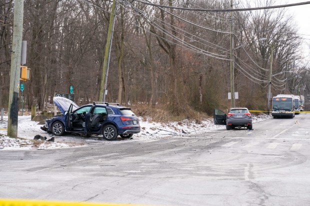 The aftermath of a crash involving a grey Honda HRV SUV and a blue Audi Q5 SUV at the intersection of Forest Hill Rd. and Rockland Ave. in Staten Island on Friday, Jan. 2, 2026. (Theodore Parisienne / New York Daily News)