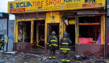 Ten injured, including firefighters, in Queens tire shop and apartment building fire