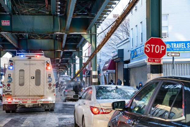 A bundle of communication wires that fell from the elevated subway tracks above Fulton St. between Linwood St. and Elton St. in Cypress Hill, Brooklyn, damaged six cars on Friday, Jan. 30, 2026. (Theodore Parisienne / New York Daily News)