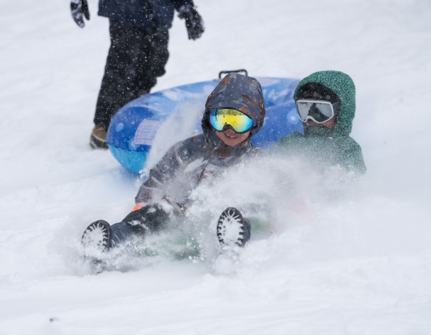 People enjoy sledding on Cedar Hill in Central Park in Manhattan on Sunday, January 25, 2026. (Barry Williams/ New York Daily News)