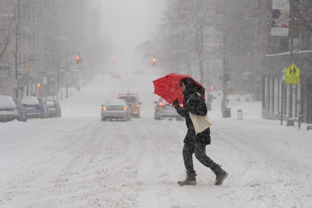 A pedestrian crosses Madison Ave. in the UES in Manhattan on Sunday, January 25, 2026. (Barry Williams/ New York Daily News)