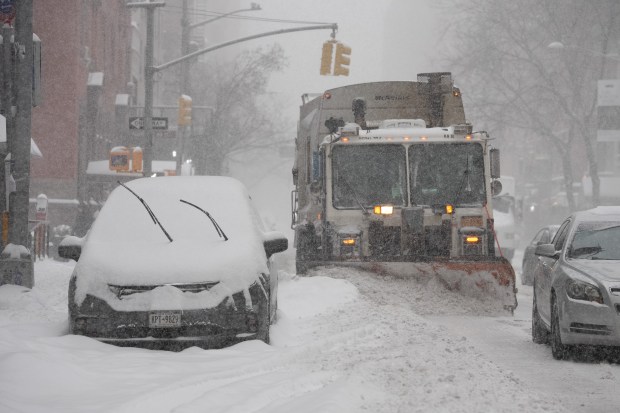 A snow plow clears snow on Lexington Ave. in the UES Sunday, January 25, 2026 in Manhattan, New York, New York. (Barry Williams/ New York Daily News)