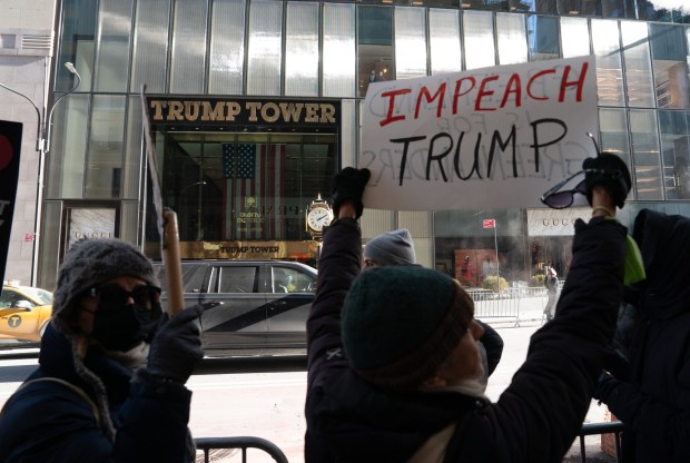 Anti-Donald Trump protesters gather outside Trump Tower in Midtown Manhattan on Tuesday, Jan. 20, 2026. (Barry Williams/ New York Daily News)