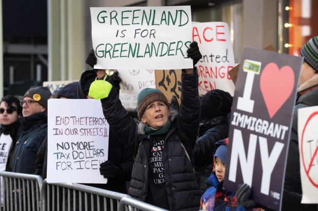 Anti-Donald Trump protester, Anne Jeffie Holmes, 70, protests outside Trump Tower in Midtown Manhattan on Tuesday, January 20, 2026. (Barry Williams/ New York Daily News)