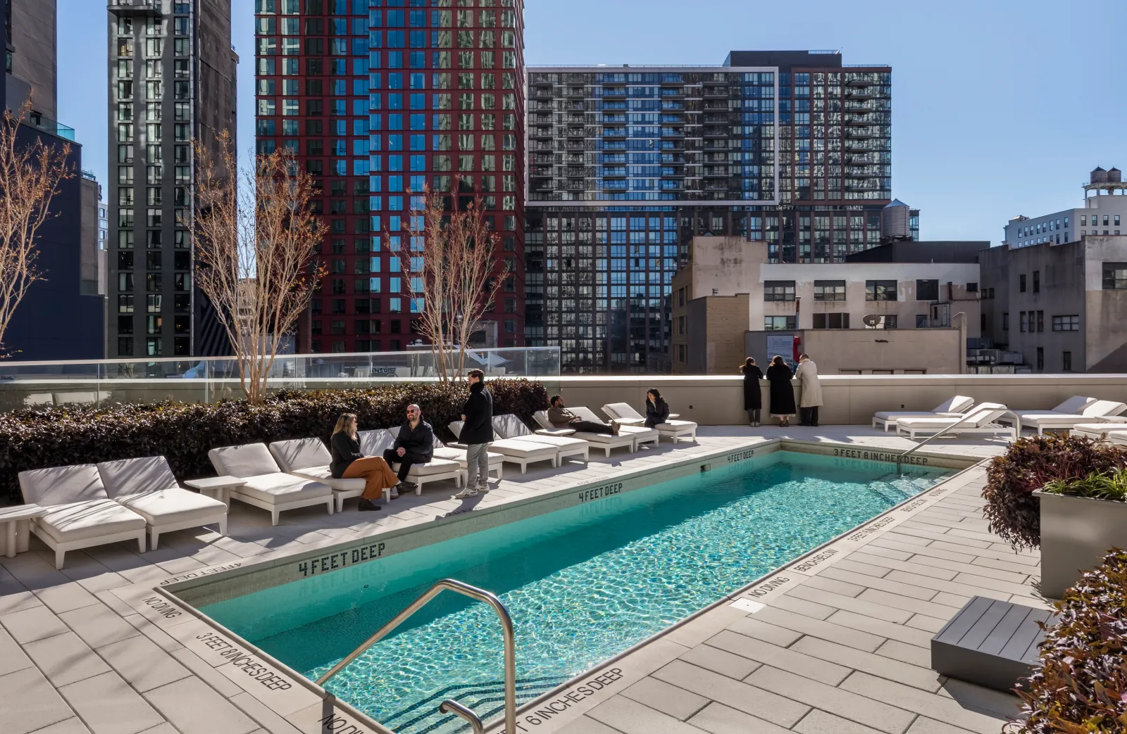 An outdoor pool at The Brook.