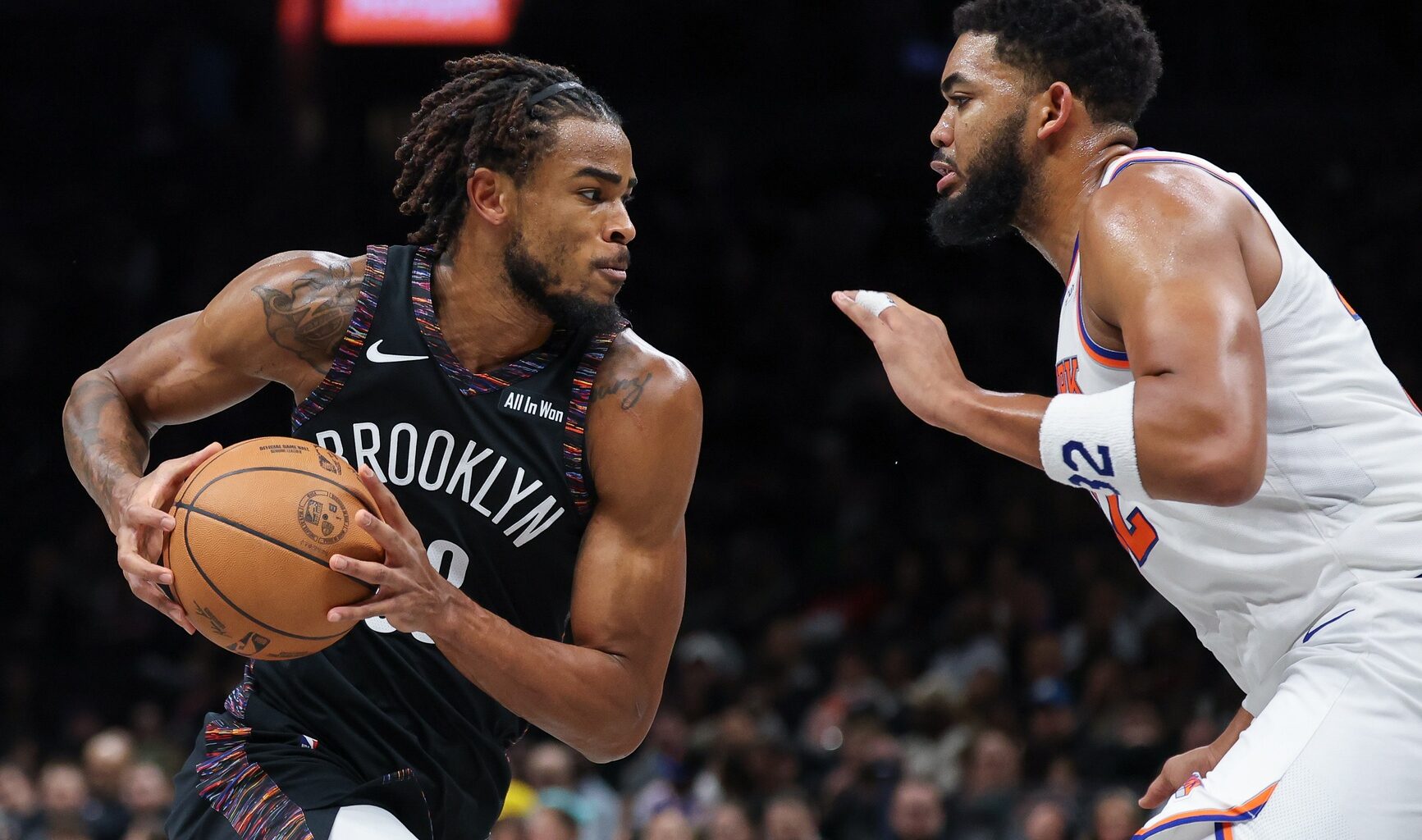 Brooklyn Nets center Nic Claxton (33) is guarded by New York Knicks center Karl-Anthony Towns (32) during the second half at Barclays Center.