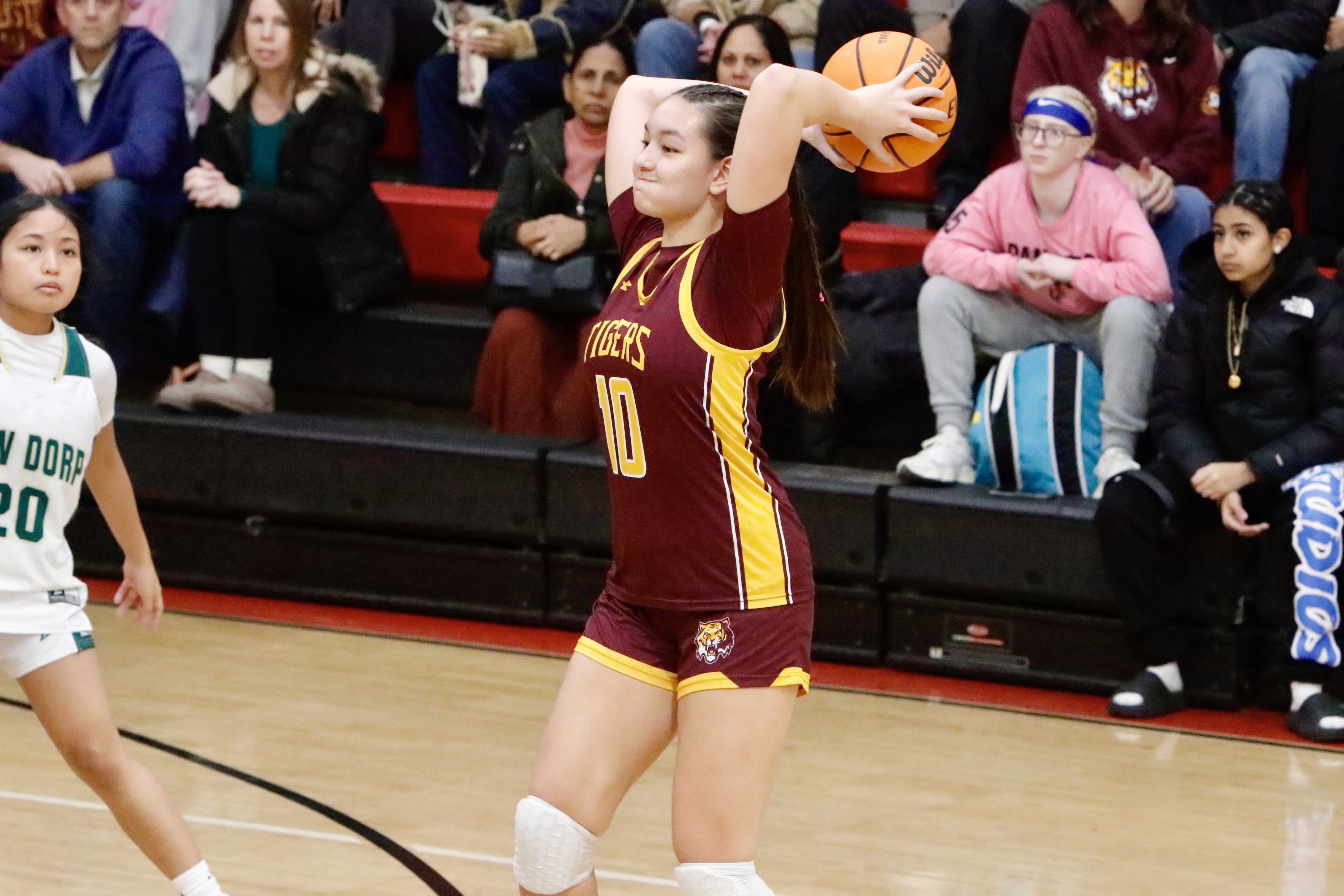 Staten Island Academy's Valentina Li looks to swing a pass during a Borough President's Cup game against New Dorp on Jan. 23, 2025.