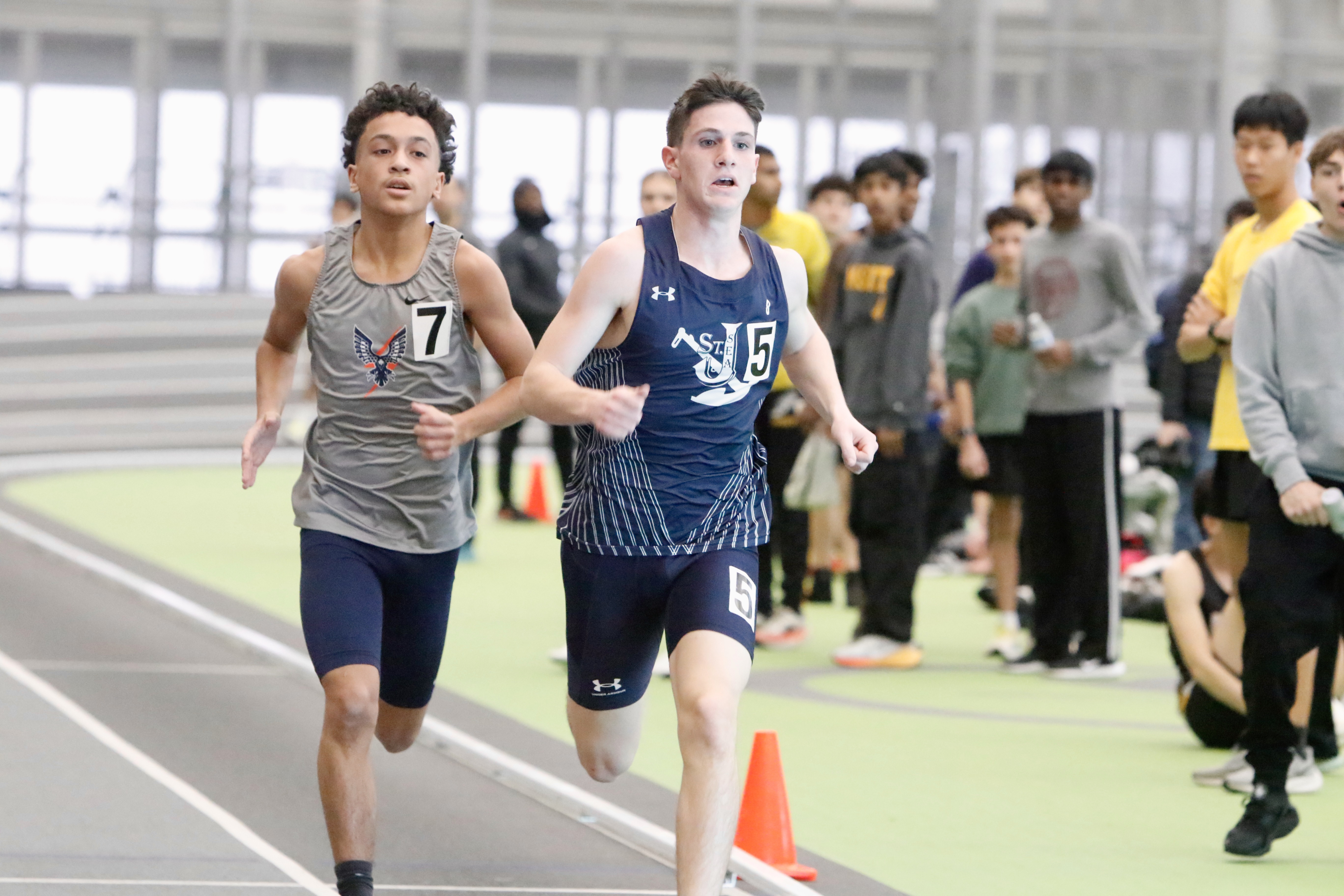 3200 meter champion Jason Sarnicola of Sea and runner-up Tristan Acevedo of Susan Wagner battle it out at the Staten Island High School Indoor Track and Field Championship on Jan. 18, 2026.