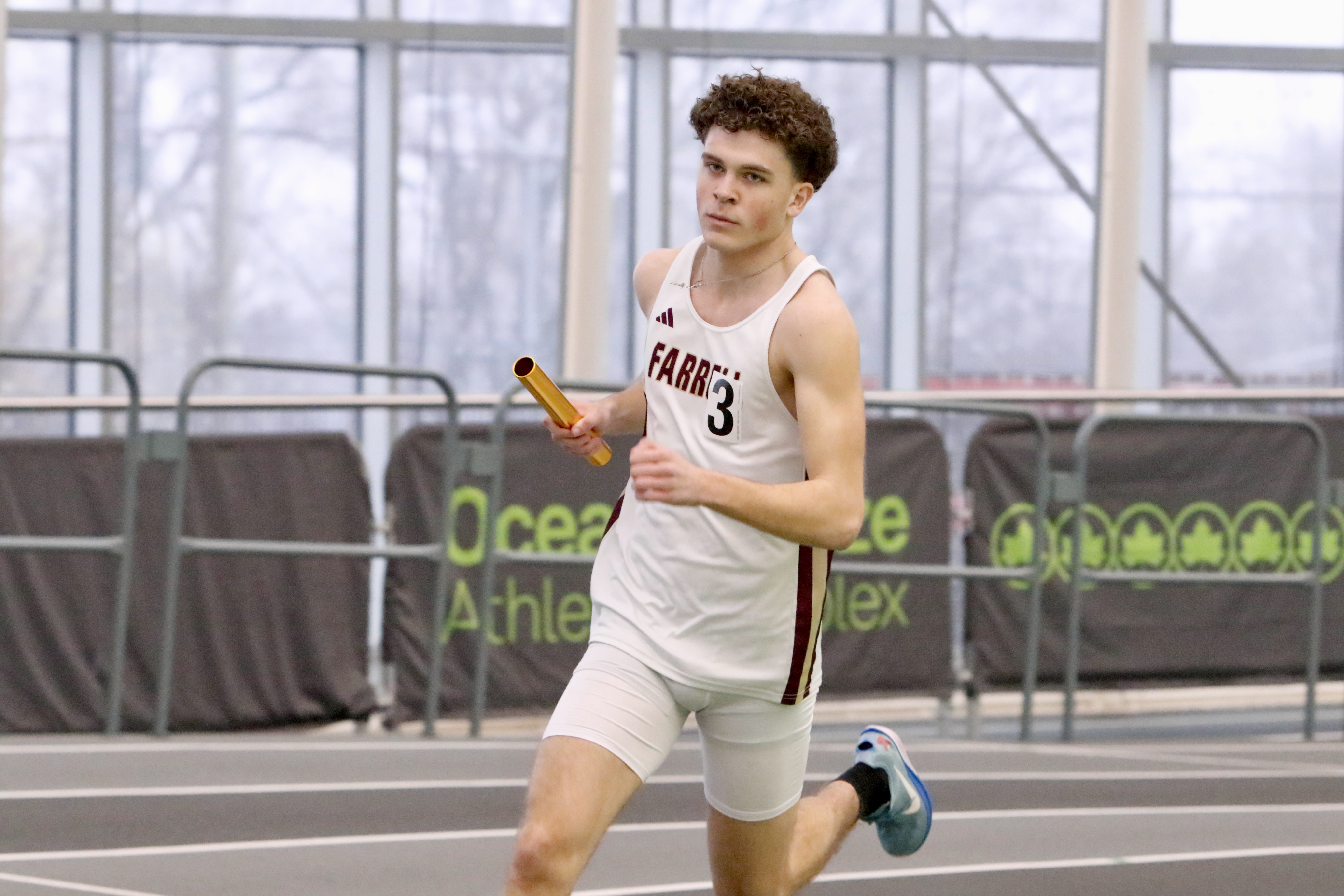 Monsignor Farrell's Joe Calabrese runs a leg of the Lions' winning 4x800 meter relay at the Staten Island High School Indoor Track and Field Championship on Jan. 18, 2026.