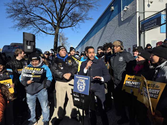 Brooklyn Borough President Antonio Reynoso speaks at a rally in support of Amazon workers in Woodside in December. Valdez was also present at the event. Photo by Shane O'Brien. 