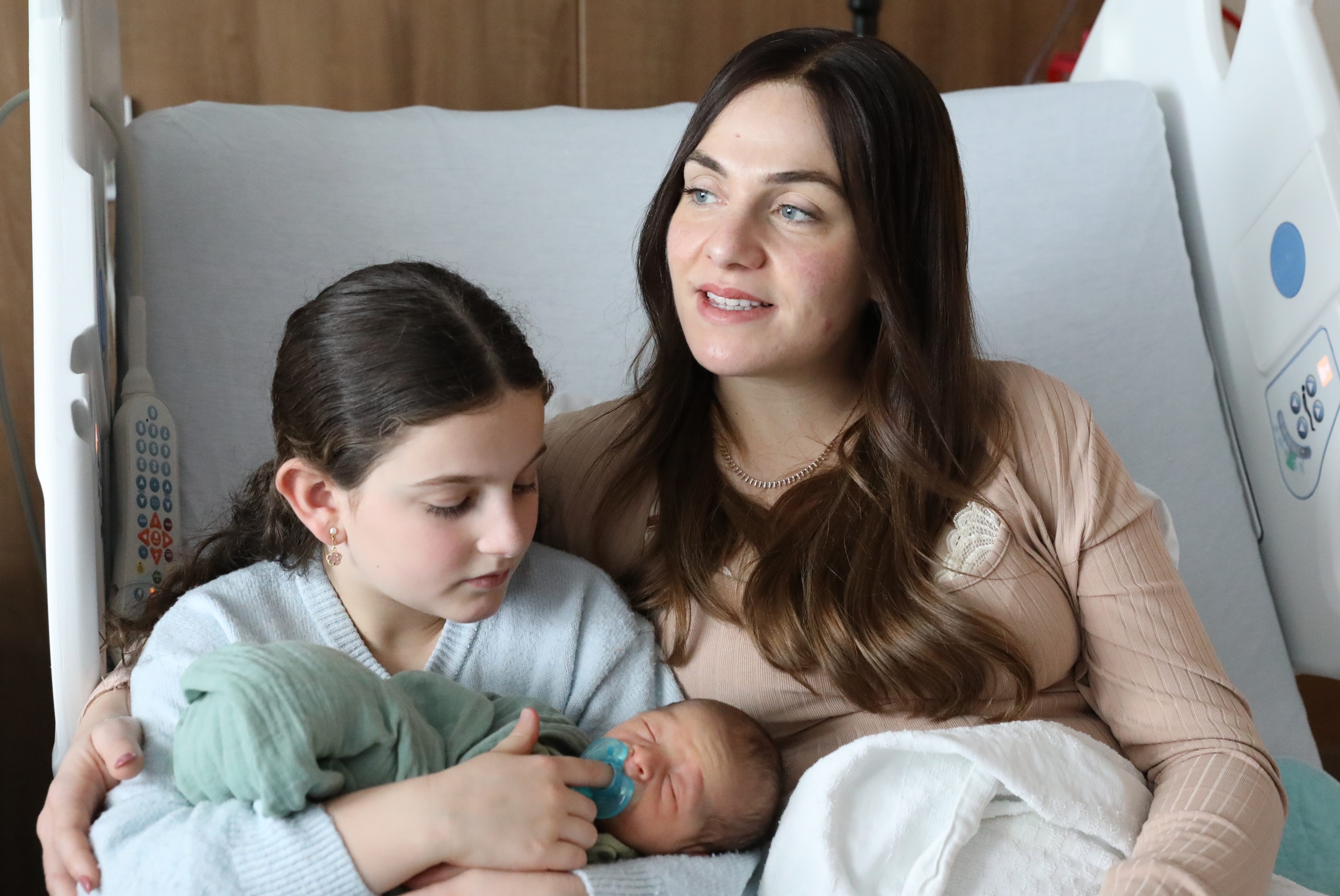 Baby boy Green’s sister Zohar Liberow, 9 and mom, Chaya are so happy at the start of this new year.  (Advance/SILive.com | Jan Somma-Hammel)