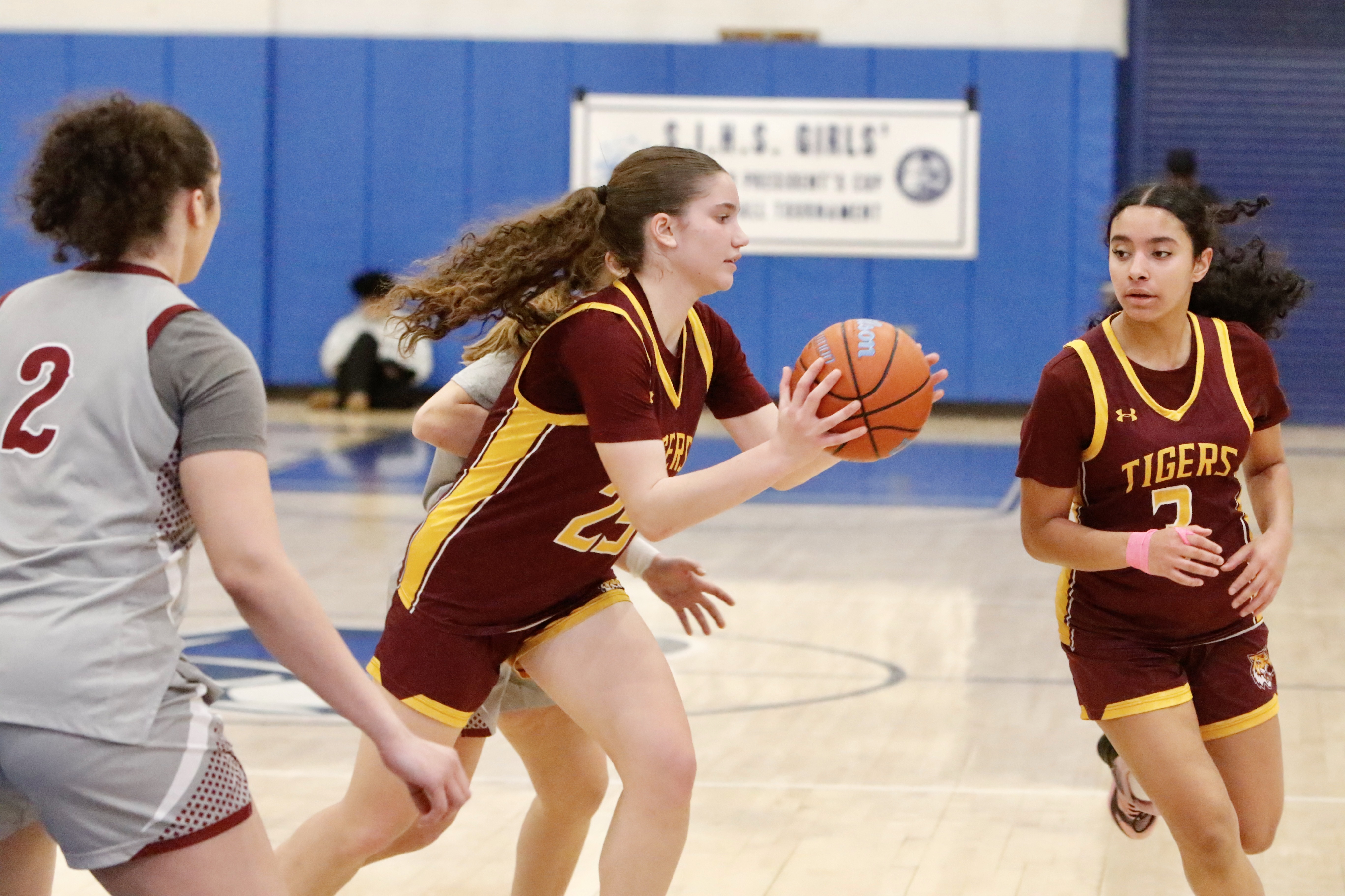 Staten Island Academy's Chloe Factor looks to make a pass during a Borough President's Cup quarterfinal meeting vs. Curtis on Jan. 27, 2025.