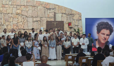 A group photo during a 2025 Young Adult Retreat at Holy Cross Church in the Bronx.