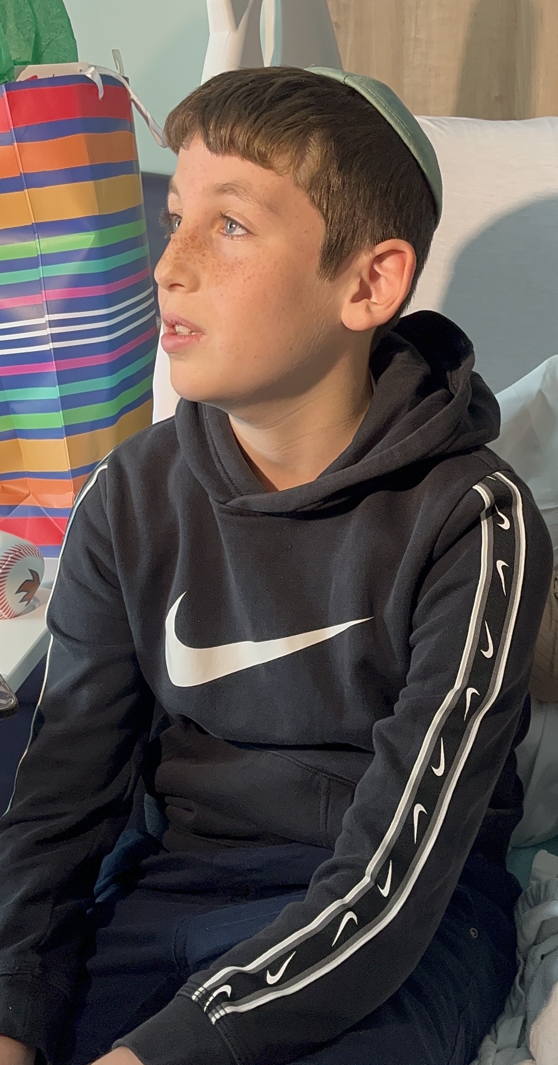 Baby boy Green's Uncle Yossi Althaus, 12,  came from Australia, and is grateful to be here celebrating the birth of his nephew after getting hit with shrapnel in the Bondi Beach shooting.  (Advance/SILive.com | Jan Somma-Hammel)