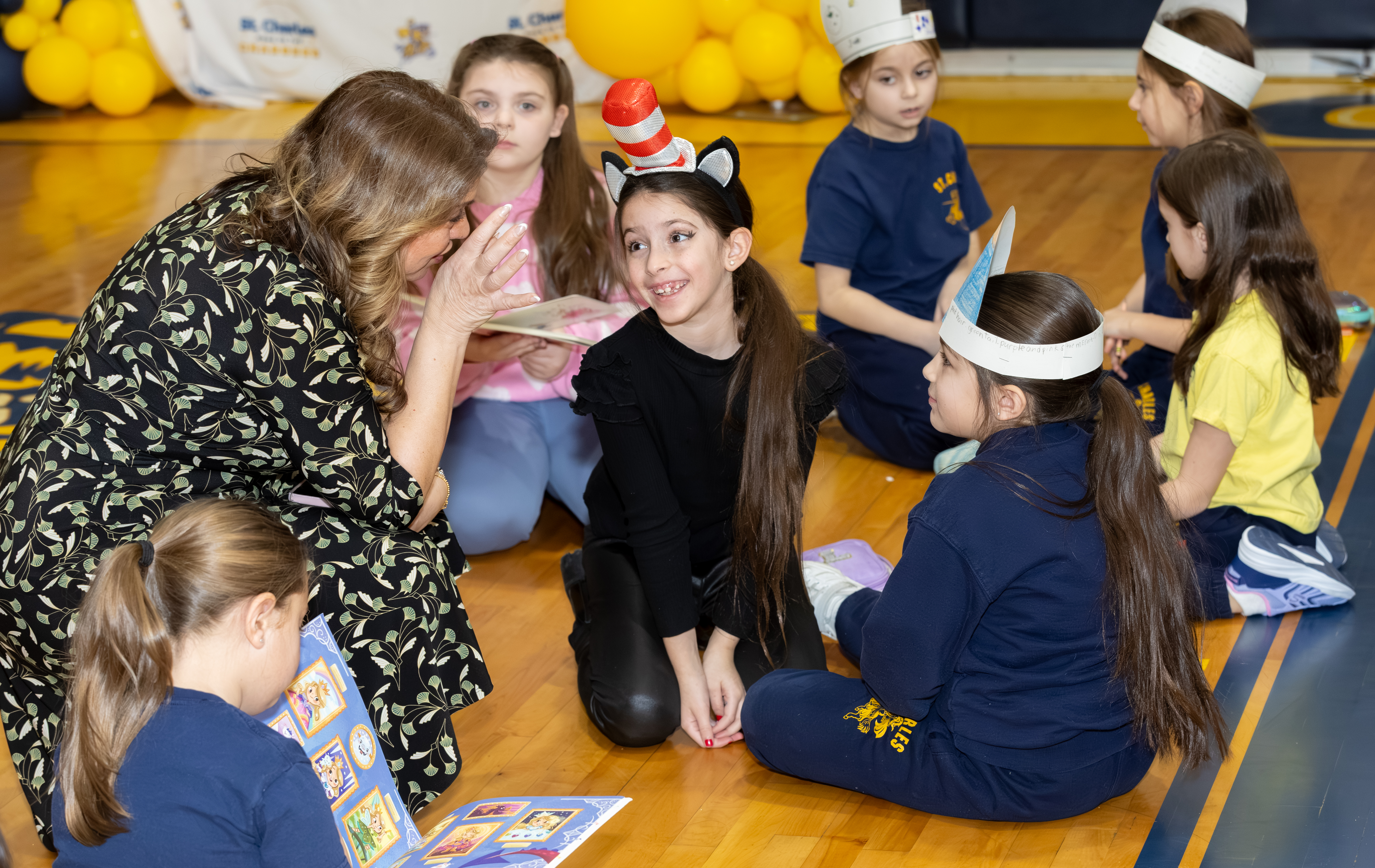 Nicole Fresca, Principal of St. Teresa-St. Rita STREAM Academy interacts with students ahead of a visit from Borough President Vito Fossella and Jann Amato, regional superintendent of the Catholic School Region of Staten Island as they celebrate literacy day with first and second graders as part of Catholic Schools Week at the St. Charles School in Oakwood on Wednesday, Jan. 28, 2026 (Advance/SILive.com | Jason Paderon)