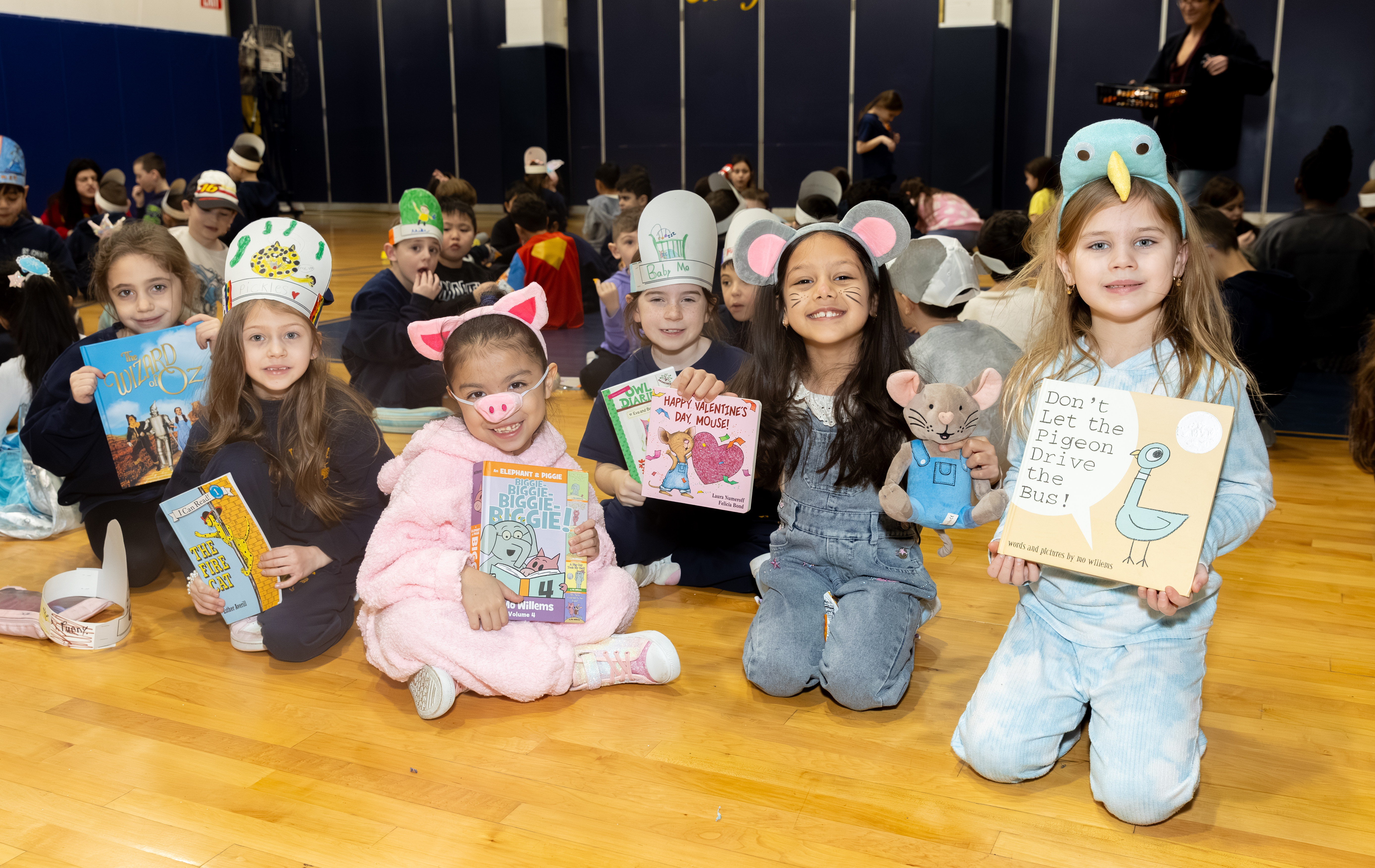 Borough President Vito Fossella and Jann Amato, regional superintendent of the Catholic School Region of Staten Island, celebrate literacy day with first and second graders as part of Catholic Schools Week at the St. Charles School in Oakwood on Wednesday, Jan. 28, 2026 (Advance/SILive.com | Jason Paderon)