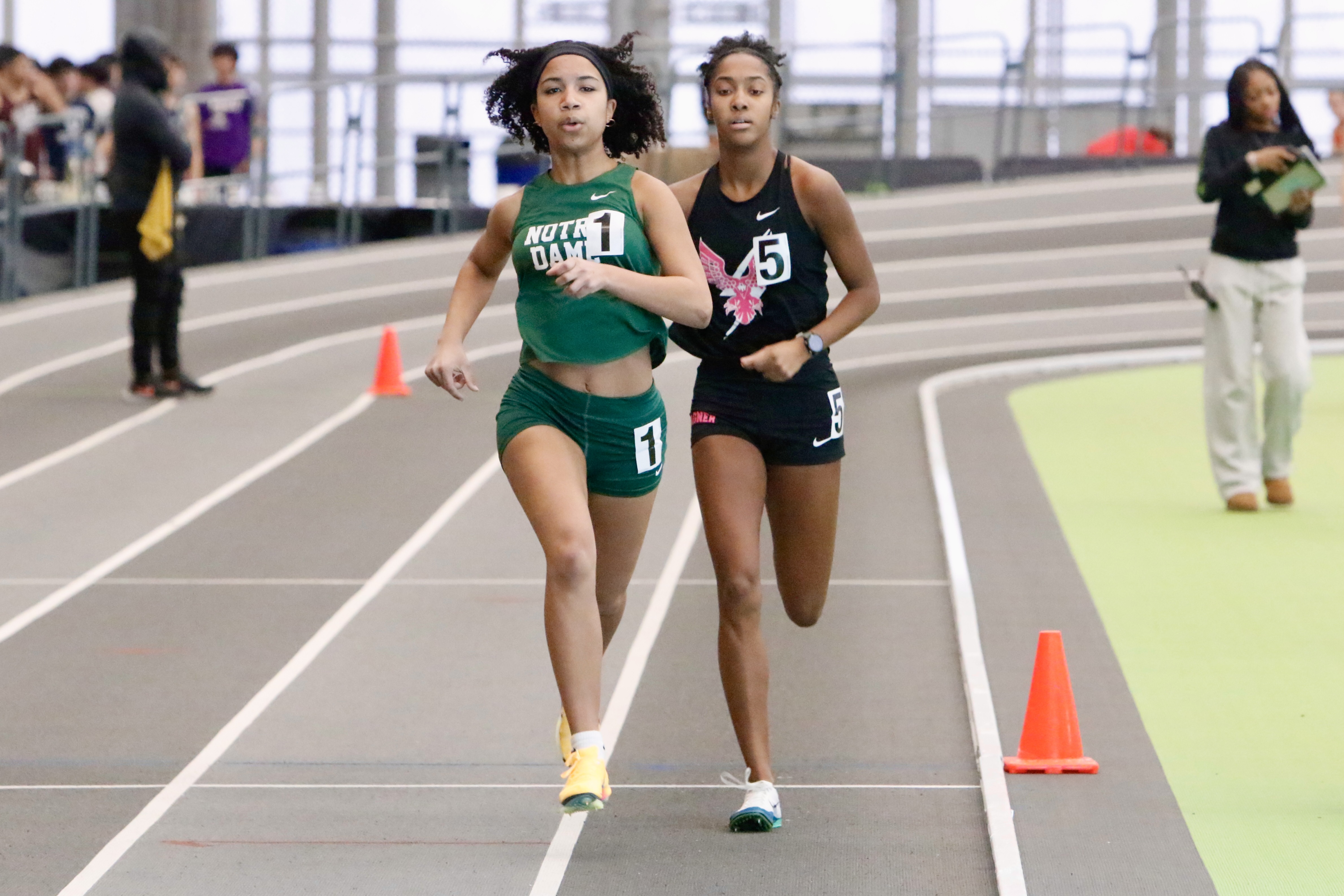Girls' 1000 meter champion Malina King Rodriguez of Susan Wagner and runner-up Savannah Rice of Notre Dame battle it out at the Staten Island High School Indoor Track and Field Championship on Jan. 18, 2026.