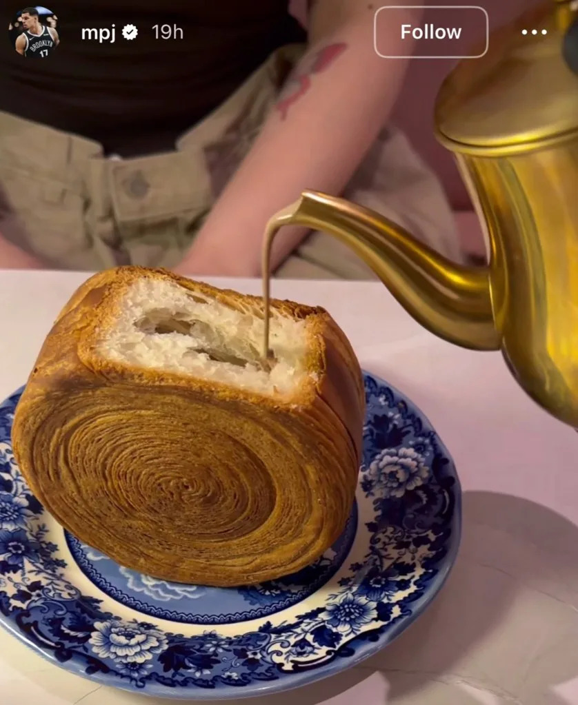 They sparked dating rumors in November 2025 after Porter posted a photo that appeared to show the rapper in the background. mpj/Instagram